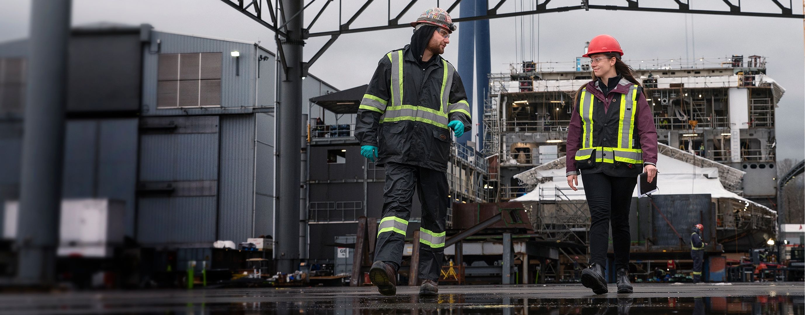 Isaac employees on site on a shipyard