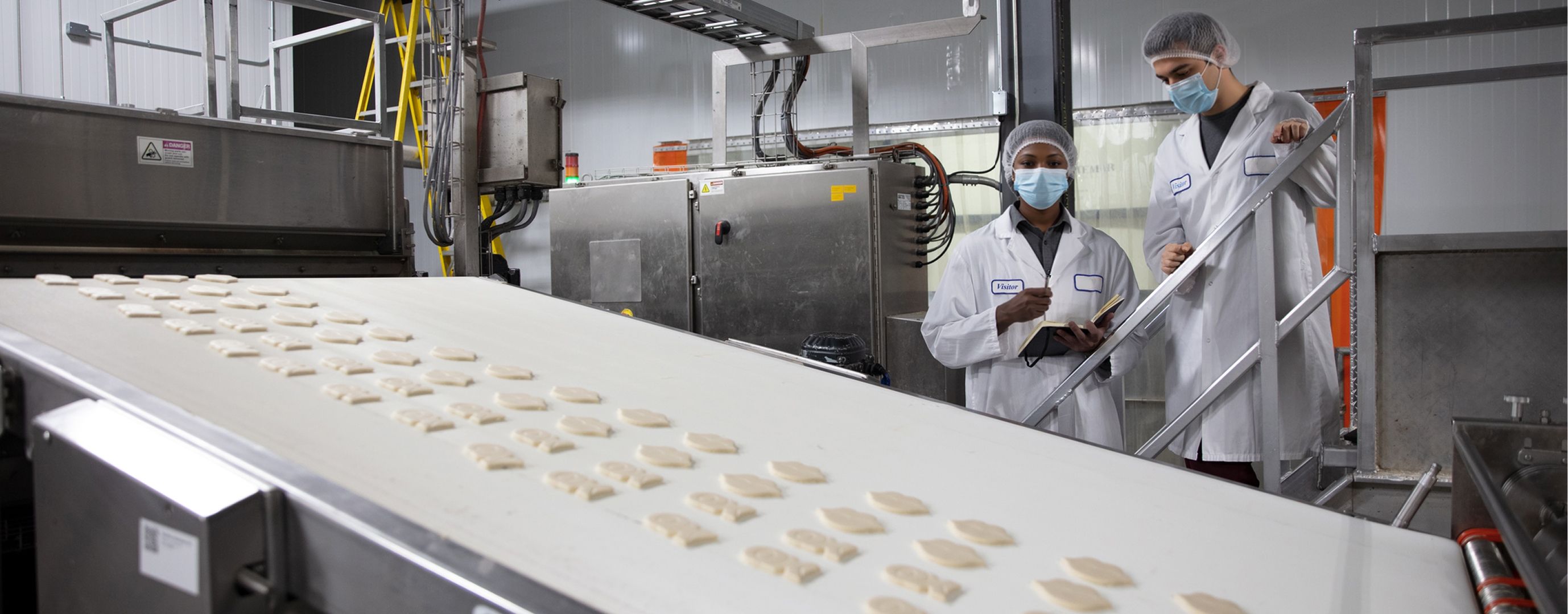 Isaac consultants monitoring a consumer product assembly line