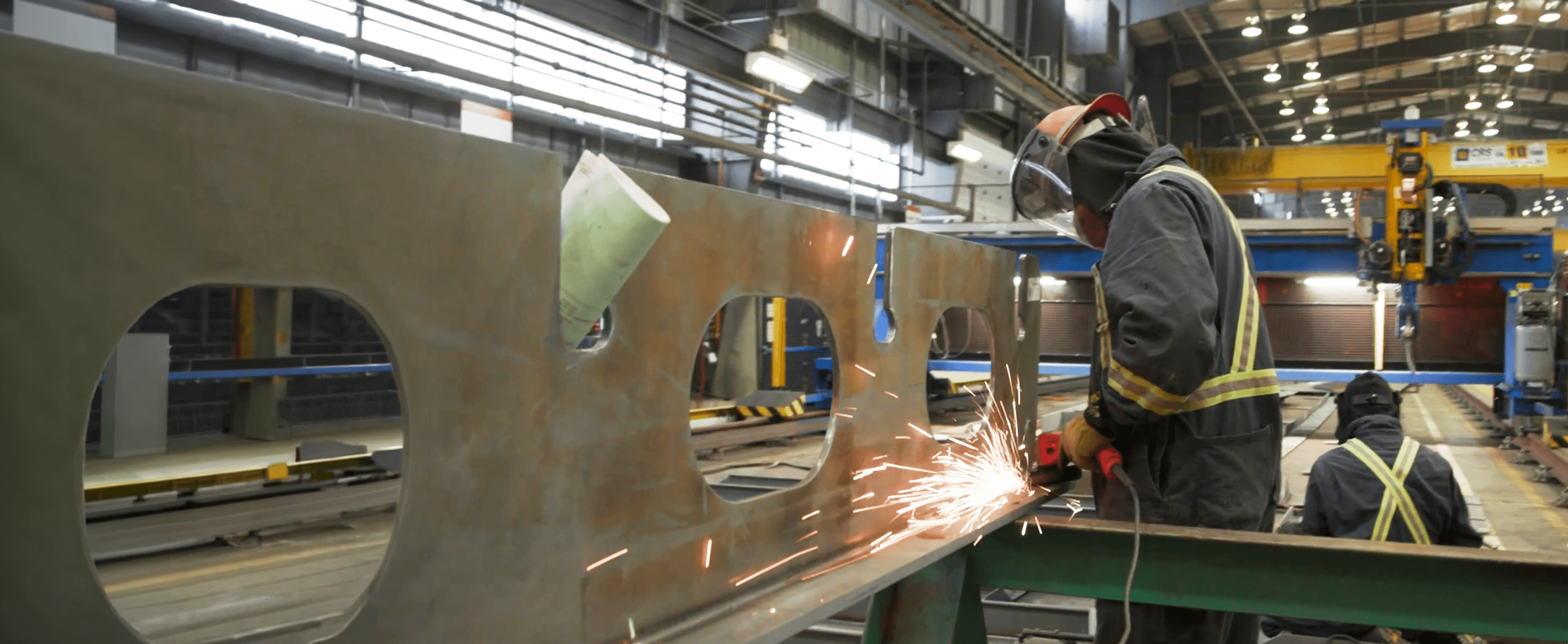 Shipbuilding operations and schedule consulting, welder at a shipyard